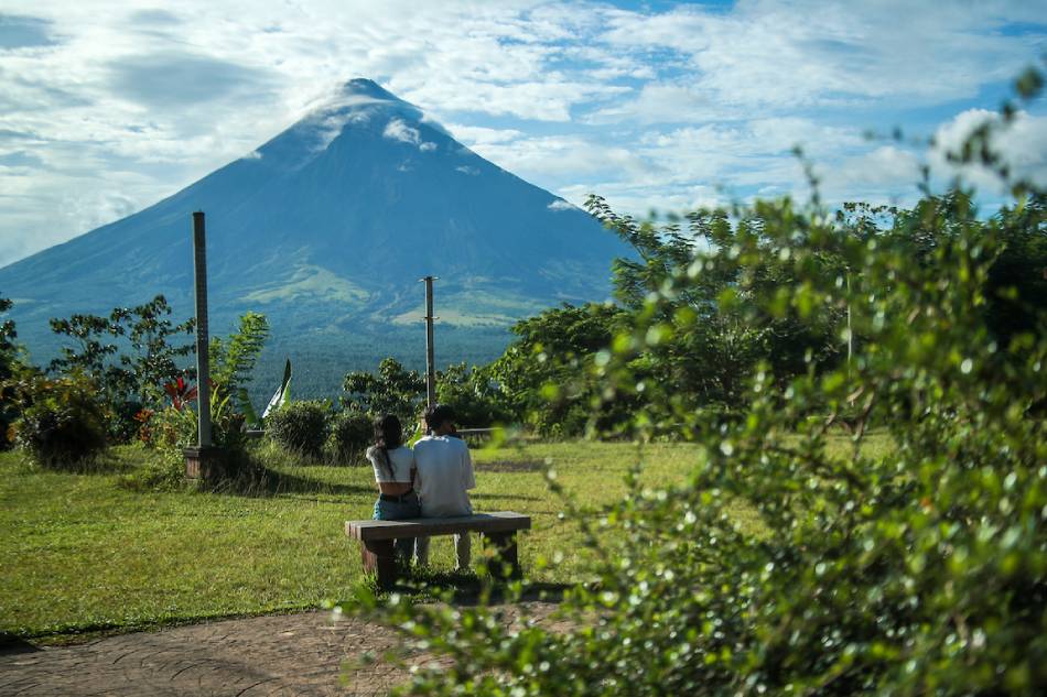 People enjoy the view of Mayon volcano from Lingon Hills in Legazpi City Albay on June 16, 2023. Jonathan Cellona, ABS-CBN News