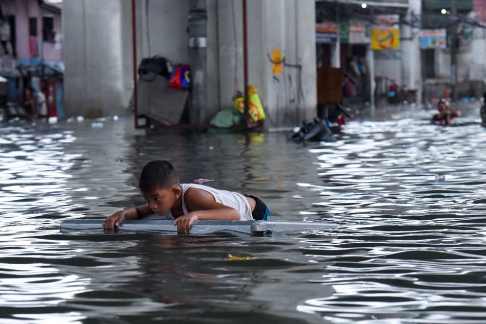 LOOK: Habagat rains bring flooding in Quezon City 4