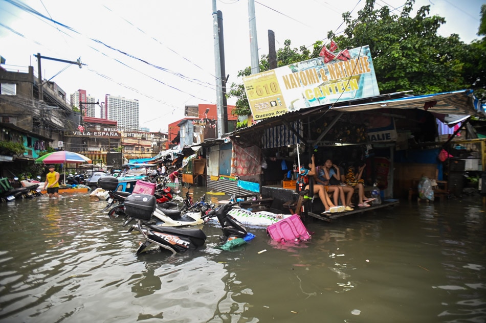 LOOK: Habagat rains bring flooding in Quezon City 7