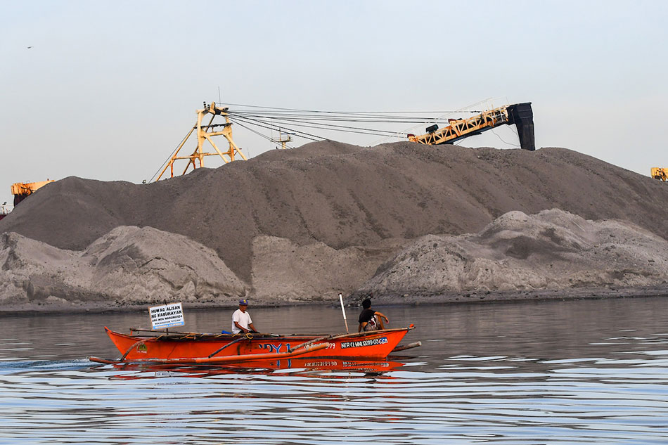 Fishermen from Cavite, Las Piñas, Parañaque, Navotas, and Bulacan conduct a fluvial protest, calling for their welfare and livelihood amid an ongoing reclamation project happening in front of the Philippine Senate in Pasay City on February 28, 2023. Mark Demayo, ABS-CBN News 