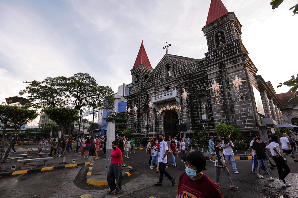People flock to the San Felipe Neri parish church in Mandaluyong for the first day of the traditional Simbang Gabi on Dec. 16, 2022. Many churchgoers were excited on the resumption of traditional Christmas practices after almost three years of pandemic restrictions. George Calvelo, ABS-CBN News/File 