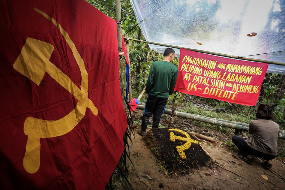 Members of the Communist Party of the Philippines conduct a post-celebration of its 49th founding anniversary. Mark Saludes, ABS-CBN News/File