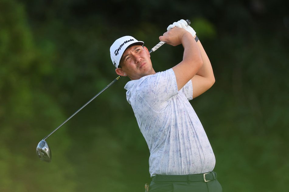Rico Hoey of the Philippines plays his shot from the fifth tee during the second round of the Sony Open in Hawaii at Waialae Country Club on January 12, 2024 in Honolulu, Hawaii. Michael Reaves, Getty Images/AFP