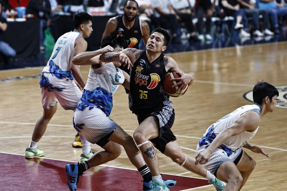 TNT guard Kim Aurin drives to the hoop against the Phoenix Super LPG Fuel Masters in their 2023-24 PBA Commissioner