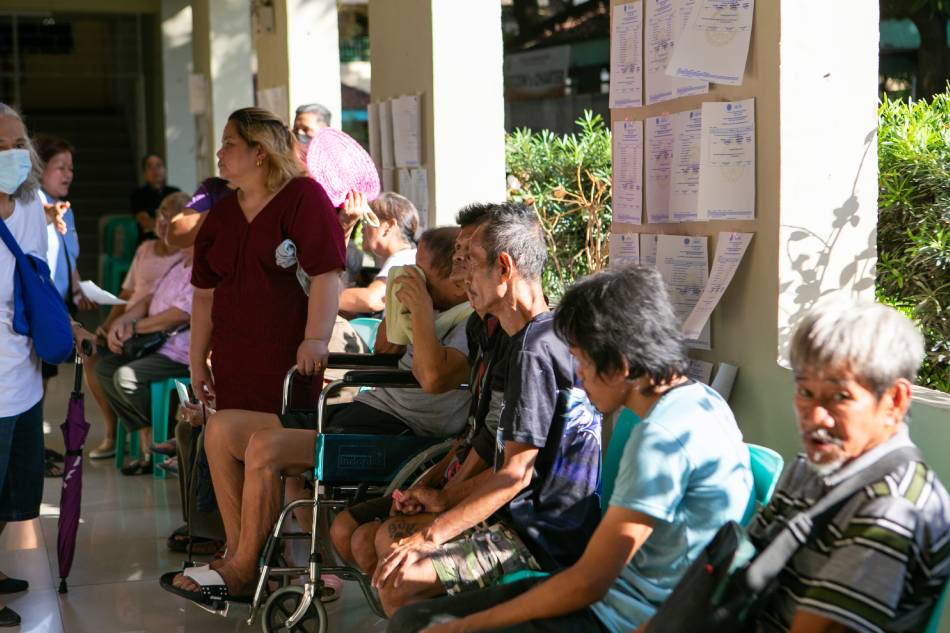 Senior citizens and PWDs, whose polling precincts are located at upper levels of the school, are accommodated to cast their votes for the Barangay election at the faculty room of the Jose Rizal Elementary School in Pasay City. Gigie Cruz, ABS-CBN News