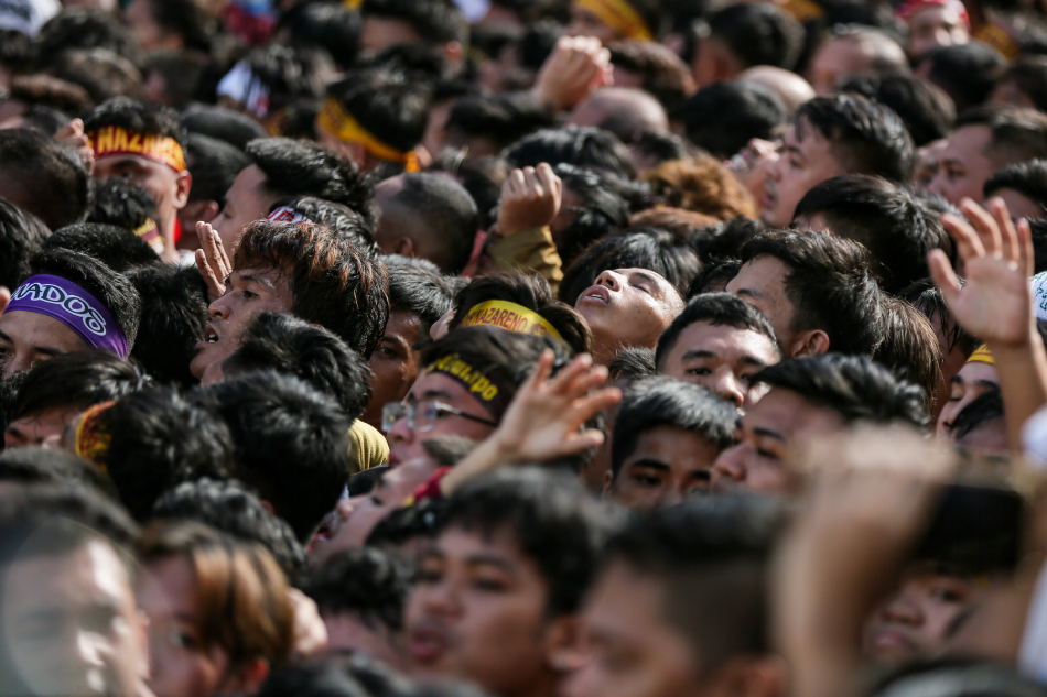 Devotees gasp for air as they remain inside the crushing crowd waiting for the Padungaw part of the Black Nazarene procession at the San Sebastian Church in Manila on January 9, 2024. Jonathan Cellona, ABS-CBN News