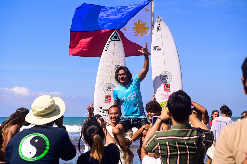 Filipino surfer John Mark Tokomg (PHL) is chaired to victory after winning the shortboard event in the World Surf League La Union International Pro in San Juan town, La Union province on Jan. 26, 2024. Maria Tan,ABS-CBN News