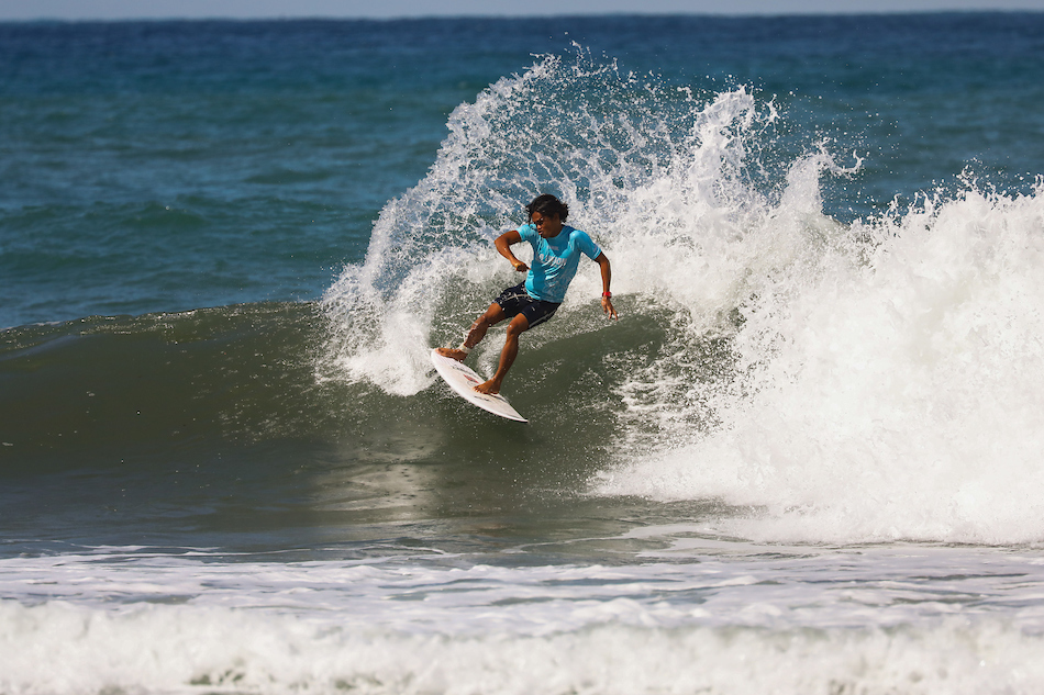 Filipino surfer John Mark Tokong braves the waves to win the men’s shortboard event in the World Surf League La Union International Pro in San Juan town, La Union province on Jan. 26, 2024. Maria Tan, ABS-CBN News