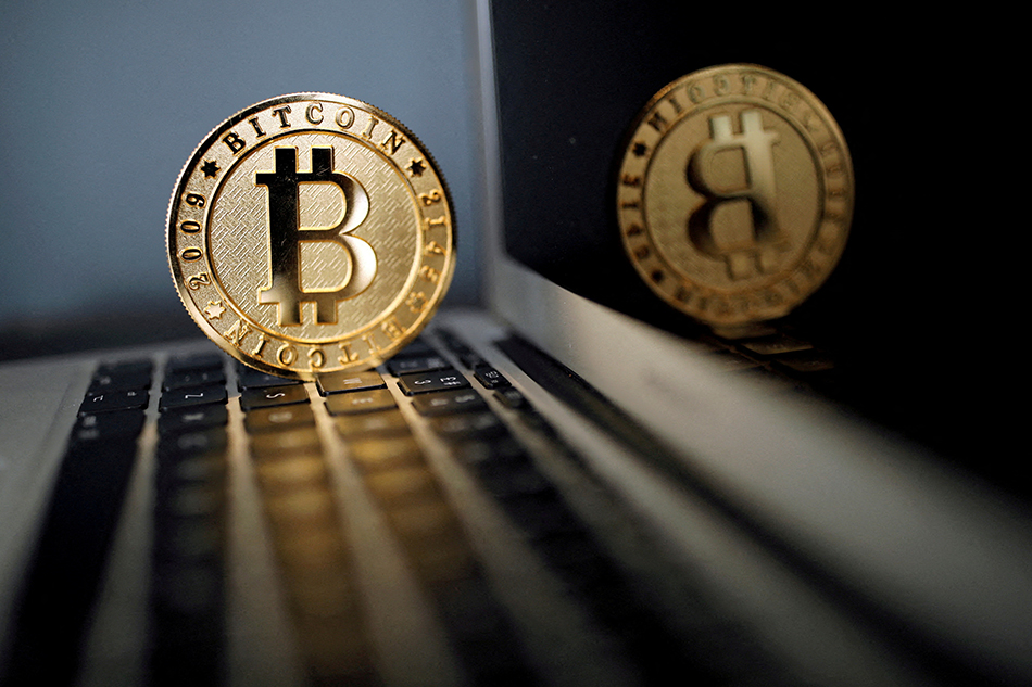A bitcoin is seen in an illustration picture taken at La Maison du Bitcoin in Paris, France, June 23, 2017. Benoit Tessier, Reuters/File 