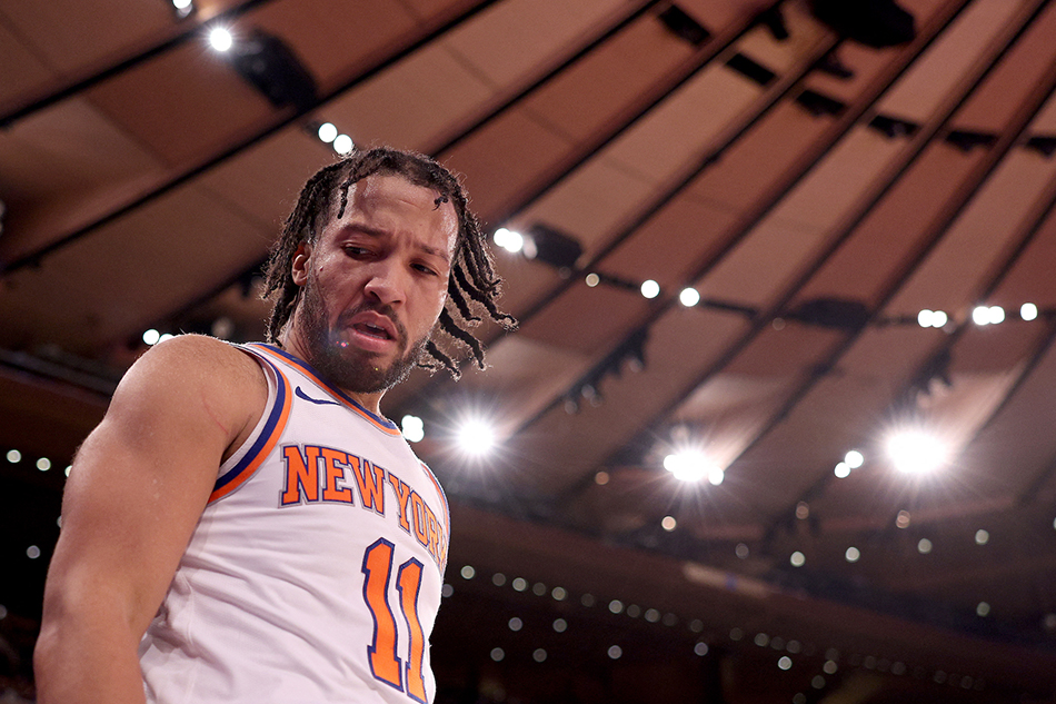 Jalen Brunson (11) of the New York Knicks walks back onto the court after chasing a loose ball at Madison Square Garden in New York City. Elsa, Getty Images via AFP