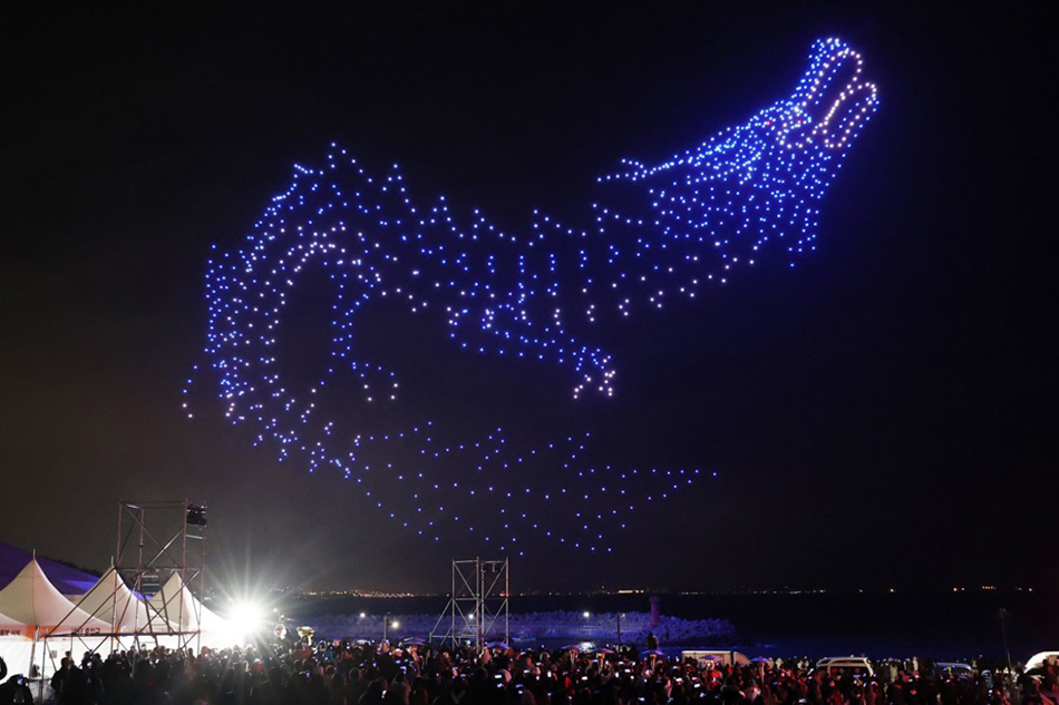 Drones lit up to create an image of a blue dragon over Cape Ganjeol, a coastal point where the sunrise can be viewed the earliest on the Korean Peninsula, on the coast of Ulsan, South Korea4, as part of festivities to mark the start of 2024, the Year of the Dragon in the Chinese zodiac. Yonhap, EPA-EFE