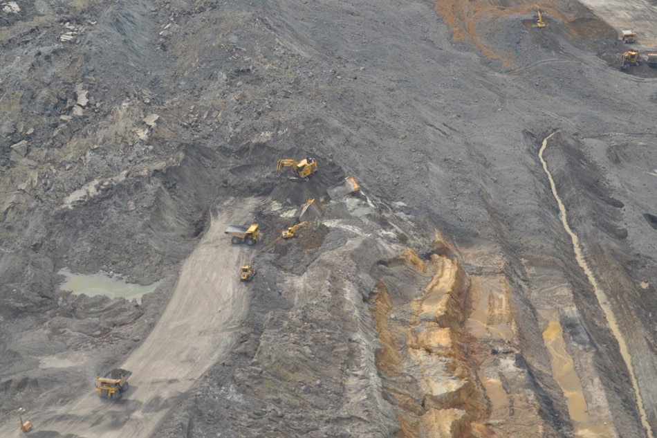 Buried alive: Aerial photos of Semirara mine collapse | ABS-CBN News