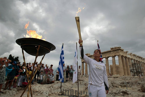Olympic torch lit in ancient Olympia | ABS-CBN News
