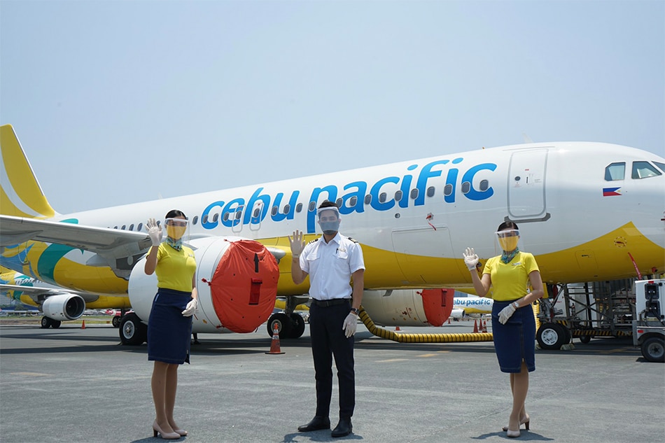 A peek at your next Cebu Pacific flight—masks on, vacant middle seats, cabin crew in PPEs 4
