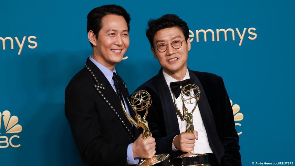 Lee Jung-jae (left) with Hwang Dong-hyuk at the 74th Emmy awards