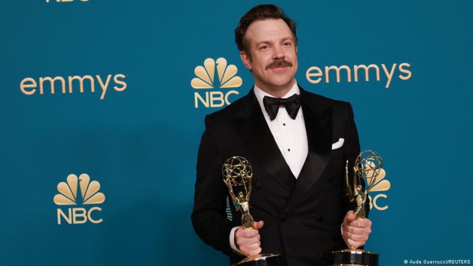 Jason Sudeikis poses with his Emmys for 'Ted Lasso'
