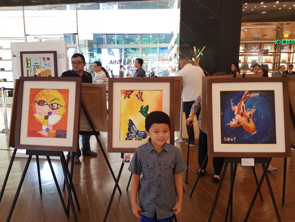 Sevi at his first group exhibit.