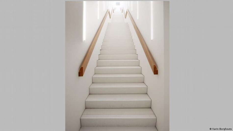 A white 'Stairway to heaven' connects different floors of the building