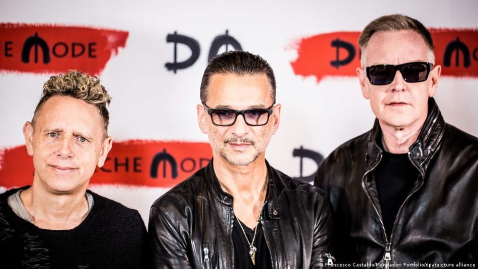 Gore (left) and Gahan (center) pay tribute to departed bandmate Andy Fletcher (right)