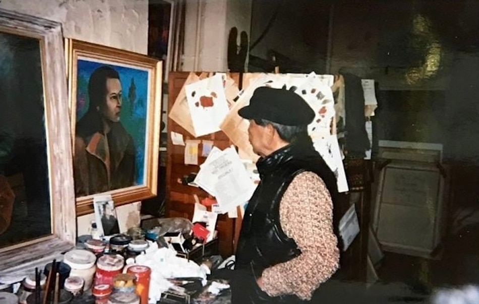 The artist in his studio. Photo courtesy of Eileen Tabios.