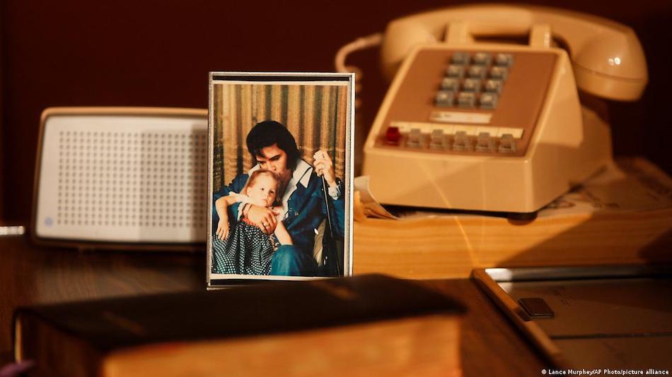 A picture of Elvis Presley with his only child featured in a 2012 Memphis exhibition.