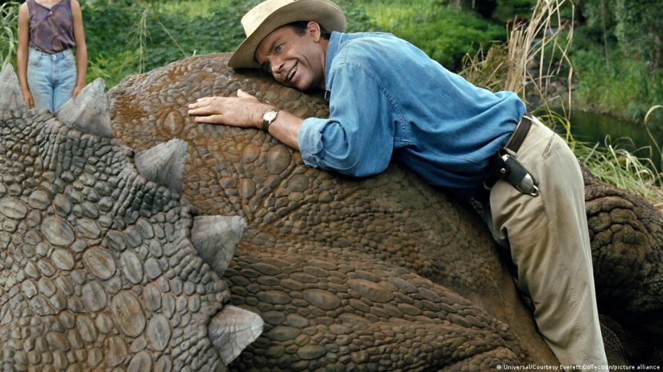 Paleontologist Alan Grant gets up close and personal with an injured triceratops