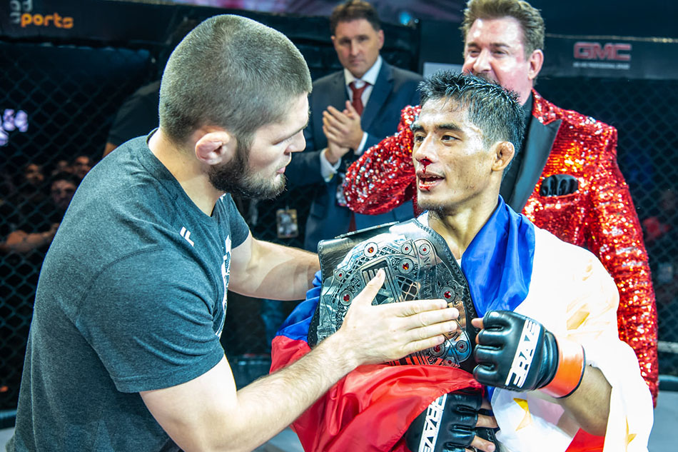 Stephen Loman (right) with now retired MMA star Khabib Nurmagomedov.