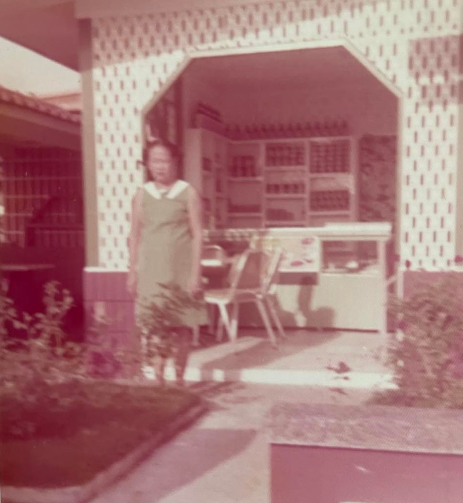 Lolita Banzon in front of her Traveler’s Kitchenette. 