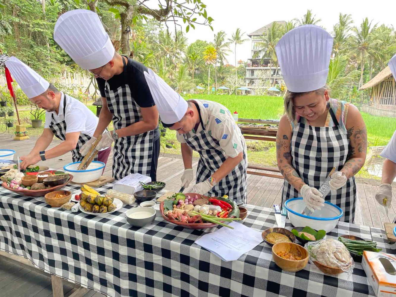 Learning to cook fish skewers and an Indonesian desert at Plataran.