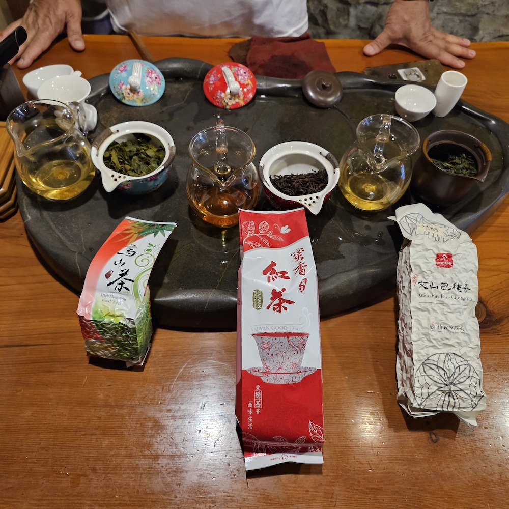 The teamaster let us try three types of tea—the Baozhong Oolong Tea, Honey-scented black tea, and Alishan Oolong tea.