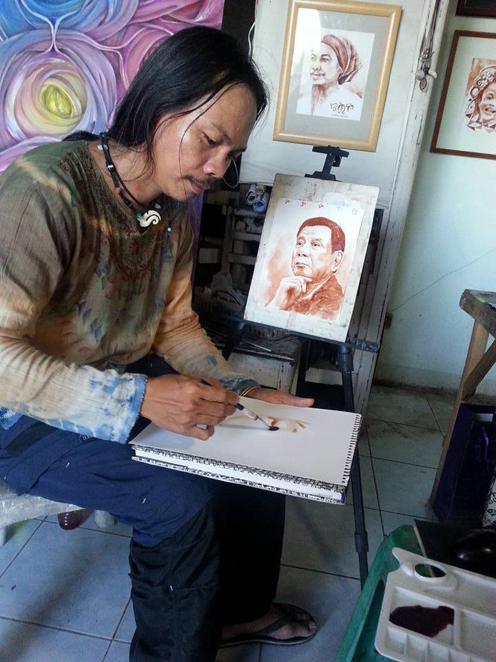 LOOK: Tacloban artist paints Duterte portrait using &#39;tuba&#39; 2