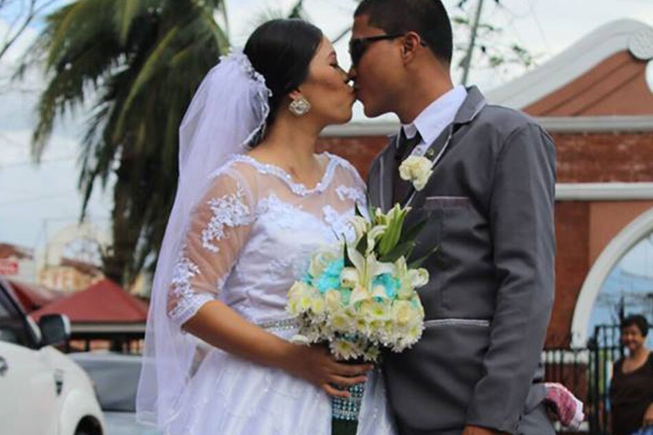 LOOK: Amid typhoon, couple pushes through with wedding 2