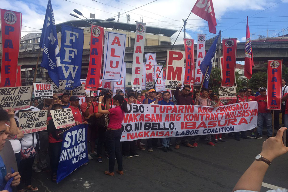 Labor groups protest DOLE's new policy on contractualization | ABS-CBN News