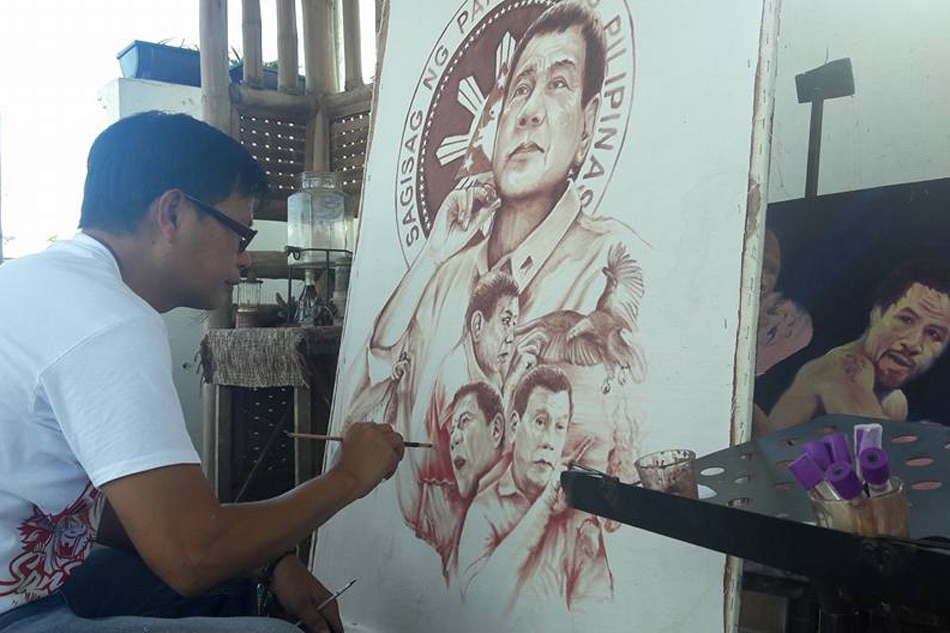 Artist uses own blood to paint Duterte masterpiece 1
