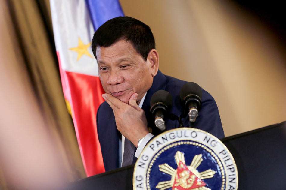 Duterte signs &#39;real change&#39; budget for 2017 1