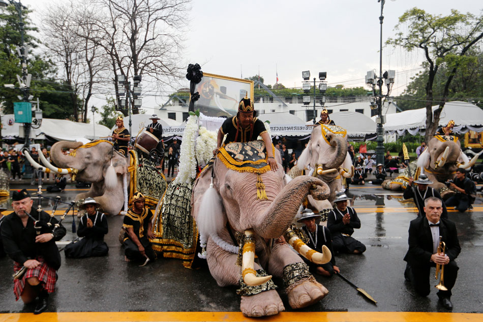 White elephants, mahouts pay respects to late Thai king