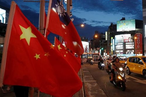 Taiwan says China waging economic warfare against tech sector